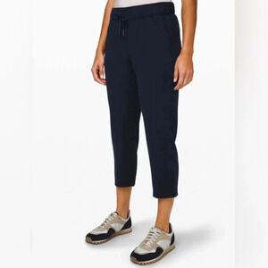Lululemon On The Fly Pant Crop Woven 23" Navy Blue Size 4 Athleisure Dress Pant